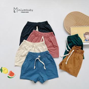 QC1531- quần đùi trơn có túi, dây nơ